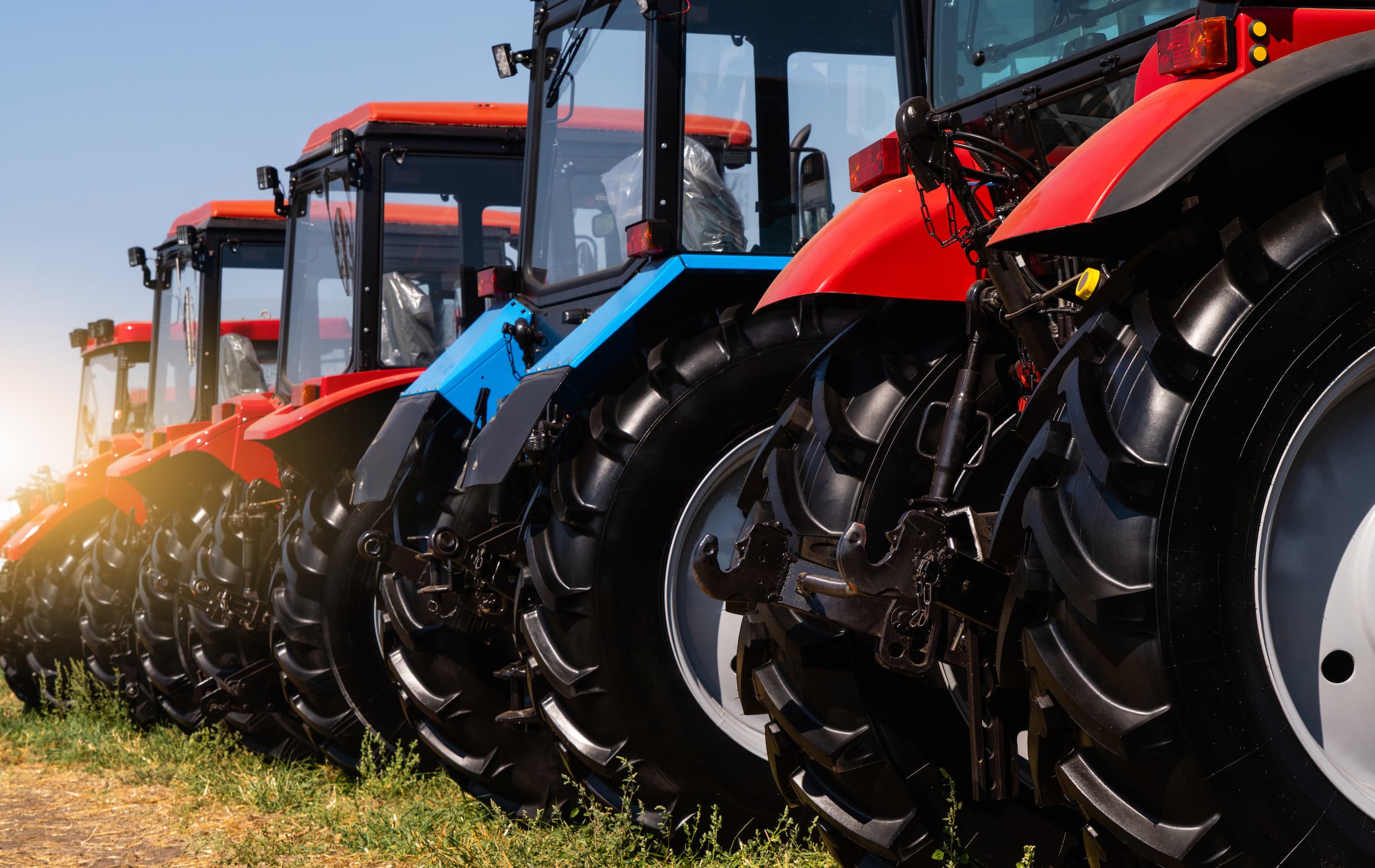 a row of agricultral tractors