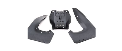 several large plastic thermoformed parts for powersports equipment