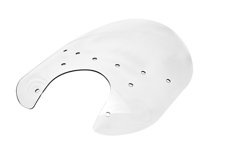 a plastic shield with air holes created through drape forming