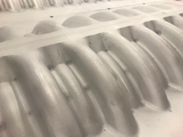 a white thermoforming mold