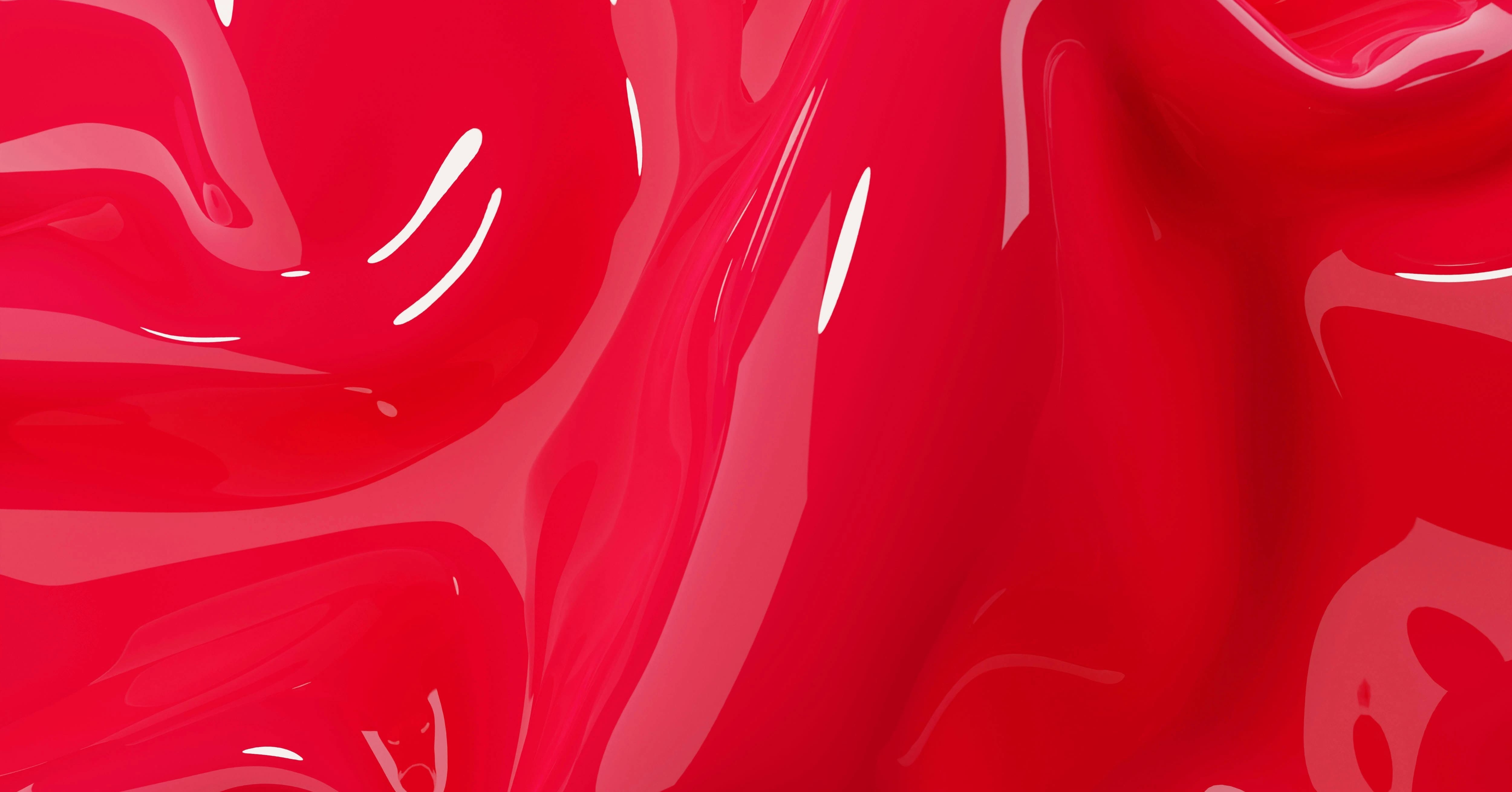 an extreme close-up of melted red plastic